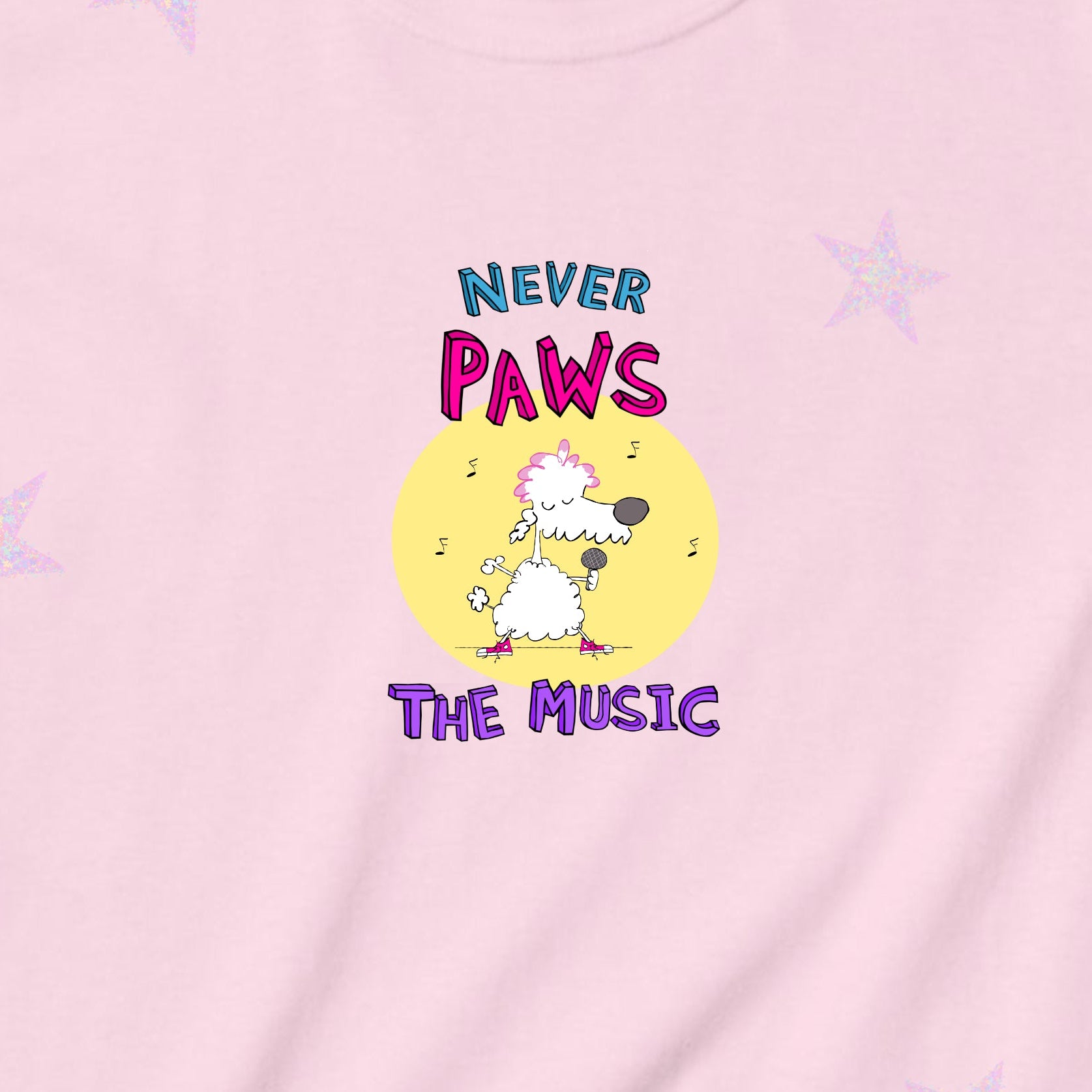 Pink t-shirt with a graphic and text on a gradient background with star patterns